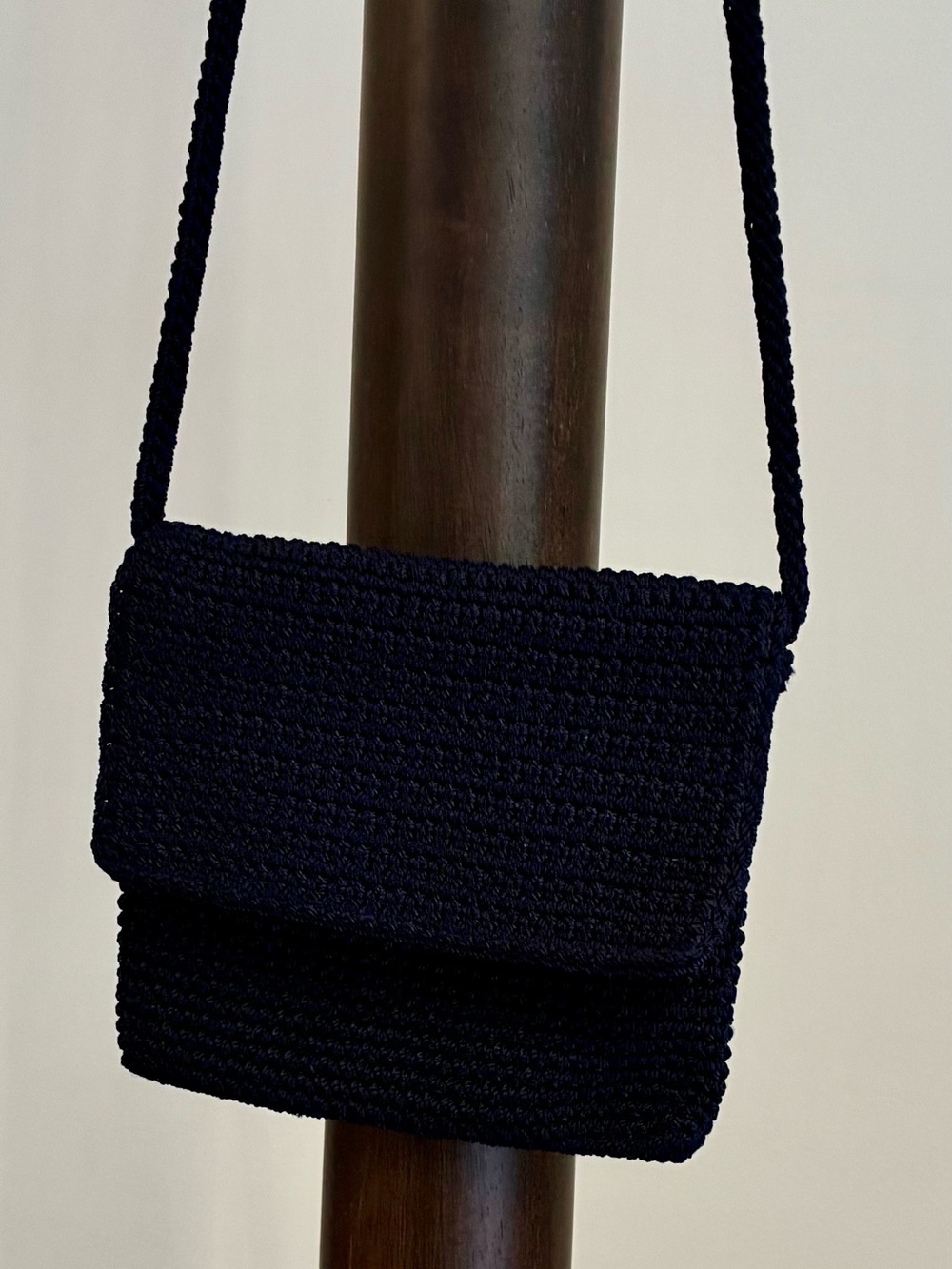 The Sak Navy Woven Crossbody Bag with Silver Tone Accent. (Not Gold Tone)